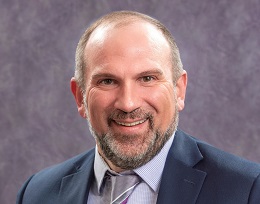 Headshot photo of Magellan's Chief Medical Officer, Dr. Samuel Pullen