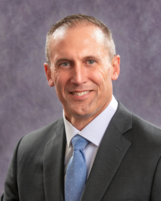 Headshot photo of Magellan's Chief Operating Officer, Seth Ingram